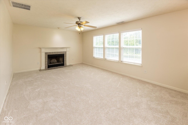6516 Amherst Way, Zionsville, IN 46077 - unfurnished living room with ceiling fan, light colored carpet, and a fireplace