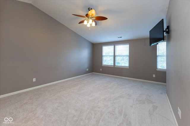 6516 Amherst Way, Zionsville, IN 46077 - empty room with vaulted ceiling, light colored carpet, and a ceiling fan