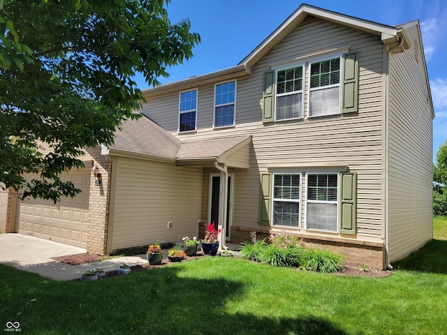 6516 Amherst Way, Zionsville, IN 46077 - traditional home with brick siding, an attached garage, a front yard, and driveway