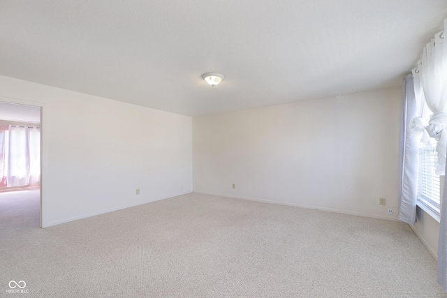 5646 Skipping Stone Dr, Indianapolis, IN 46237 - empty room featuring light carpet and baseboards