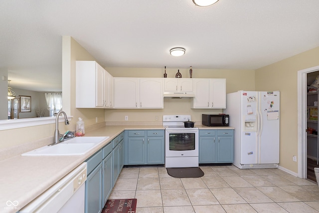 5646 Skipping Stone Dr, Indianapolis, IN 46237 - kitchen with white appliances, a sink, blue cabinets, white cabinetry, and under cabinet range hood