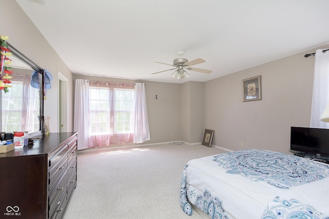 5646 Skipping Stone Dr, Indianapolis, IN 46237 - bedroom featuring light carpet, ceiling fan, and baseboards