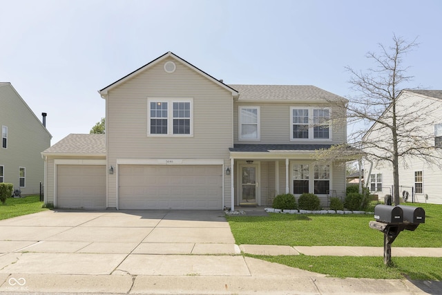 5646 Skipping Stone Dr, Indianapolis, IN 46237 - traditional-style house featuring concrete driveway, a front lawn, a garage, and a shingled roof