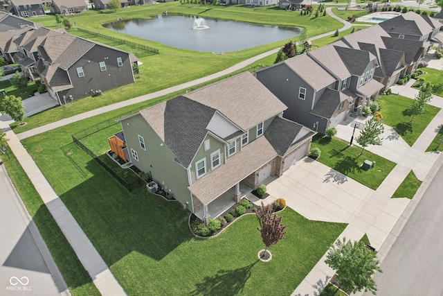 aerial view of residential area with a nearby body of water