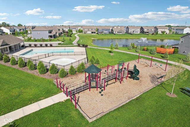 view of home's community featuring a residential view and a water view