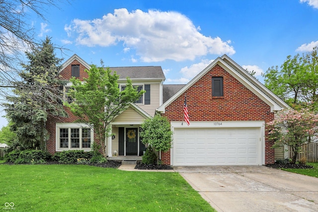 traditional home with concrete driveway, a front lawn, and brick siding