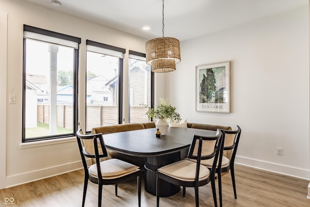 1534 Fletcher Ave, Indianapolis, IN 46203 - dining room featuring a chandelier, light wood-style flooring, and recessed lighting