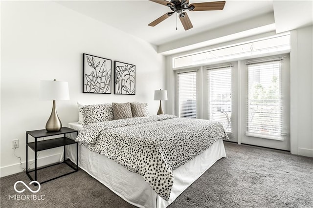 622 E 10th St Unit 212, Indianapolis, IN 46202 - carpeted bedroom with access to outside, a ceiling fan, and baseboards