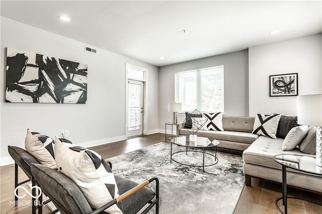 622 E 10th St Unit 212, Indianapolis, IN 46202 - living room with visible vents, recessed lighting, baseboards, and wood finished floors
