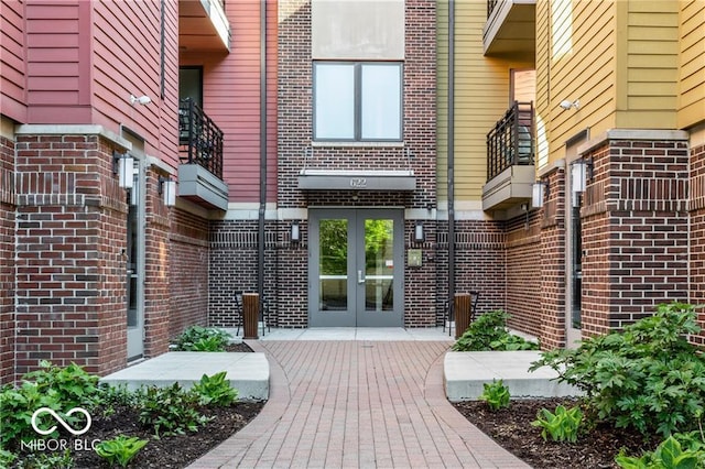 622 E 10th St Unit 212, Indianapolis, IN 46202 - view of exterior entry with brick siding and french doors