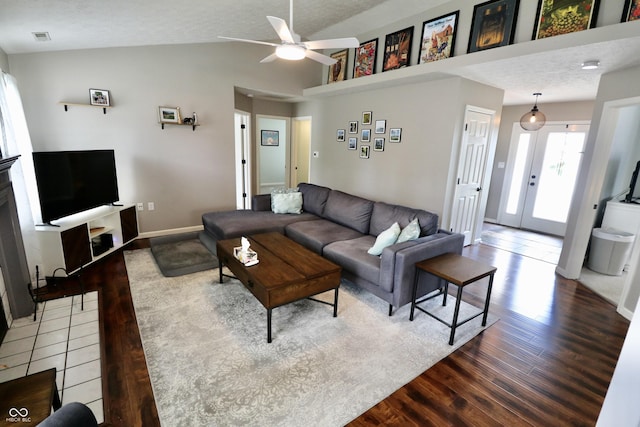 10688 Ashview Dr, Fishers, IN 46038 - living area with vaulted ceiling, a ceiling fan, wood finished floors, and visible vents
