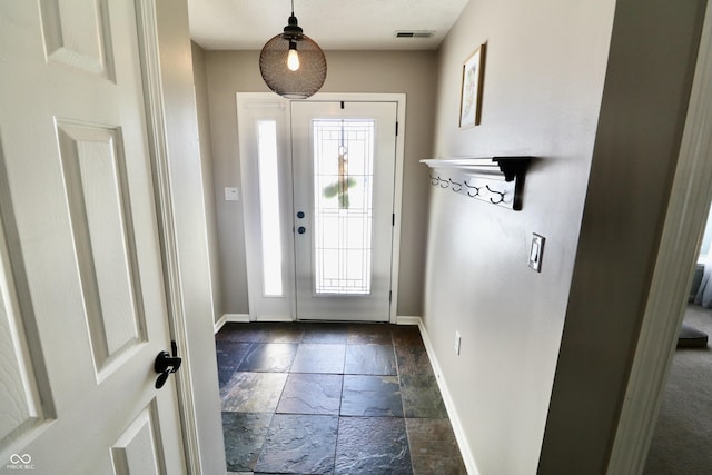 10688 Ashview Dr, Fishers, IN 46038 - entryway with stone tile flooring, baseboards, and visible vents