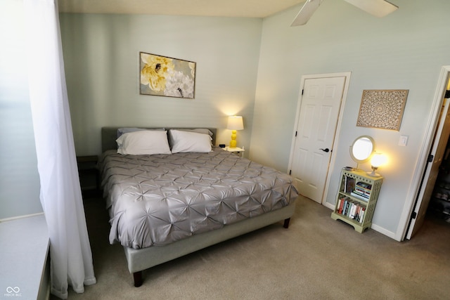 10688 Ashview Dr, Fishers, IN 46038 - carpeted bedroom with baseboards, a ceiling fan, and vaulted ceiling