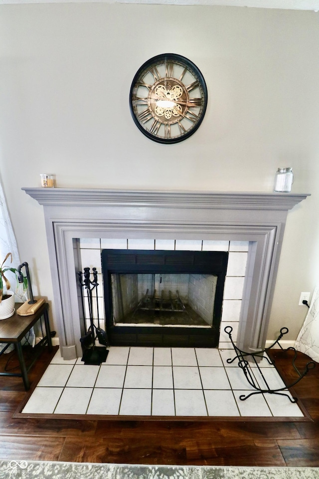 10688 Ashview Dr, Fishers, IN 46038 - details featuring wood finished floors and a fireplace
