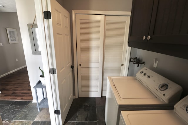 10688 Ashview Dr, Fishers, IN 46038 - washroom with baseboards, cabinet space, and washing machine and dryer