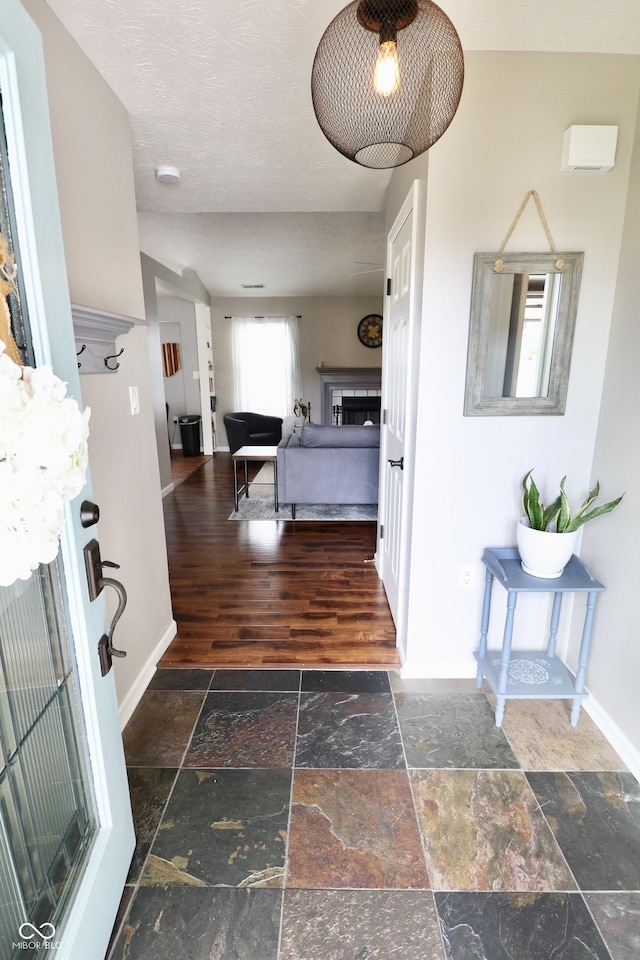 10688 Ashview Dr, Fishers, IN 46038 - corridor with baseboards and stone tile flooring