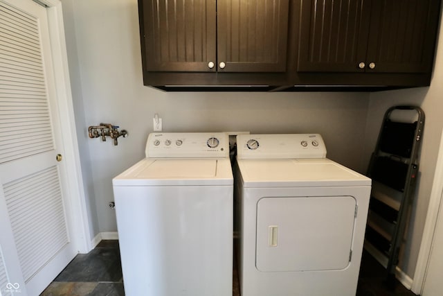 10688 Ashview Dr, Fishers, IN 46038 - laundry room with washer and dryer, baseboards, and cabinet space