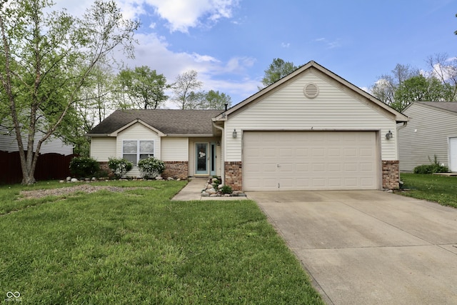 10688 Ashview Dr, Fishers, IN 46038 - single story home featuring brick siding, an attached garage, driveway, and a front yard
