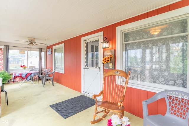 sunroom featuring carpet floors