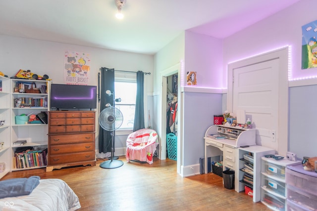bedroom featuring wood finished floors