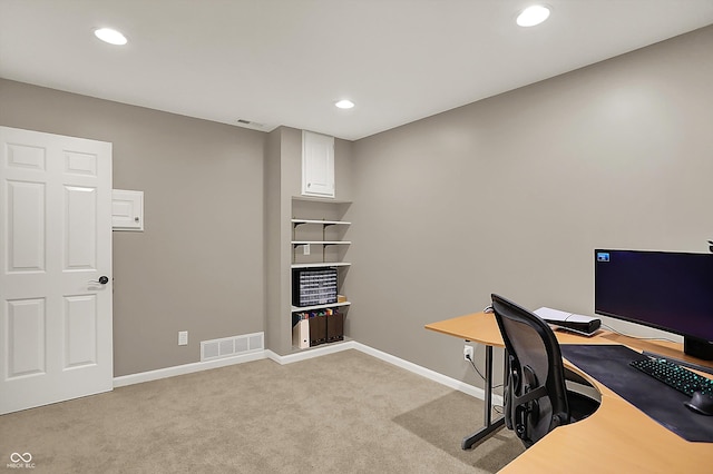 home office featuring baseboards, light colored carpet, recessed lighting, and visible vents