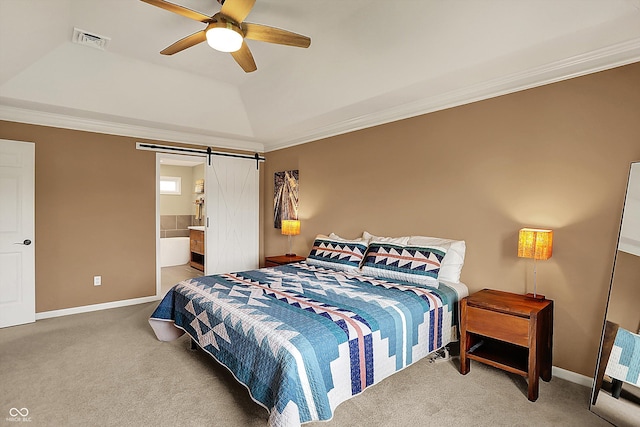 bedroom featuring visible vents, crown molding, a barn door, carpet floors, and baseboards