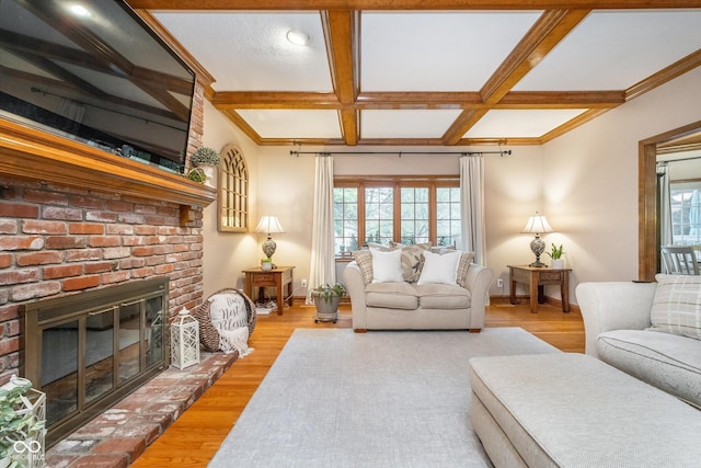4401 W Hunters Ridge Ln W, Greenwood, IN 46143 - living room with a brick fireplace, beam ceiling, baseboards, light wood-type flooring, and coffered ceiling