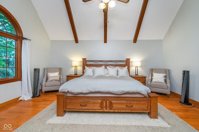 4401 W Hunters Ridge Ln W, Greenwood, IN 46143 - bedroom featuring a ceiling fan, light wood-type flooring, baseboards, high vaulted ceiling, and beamed ceiling