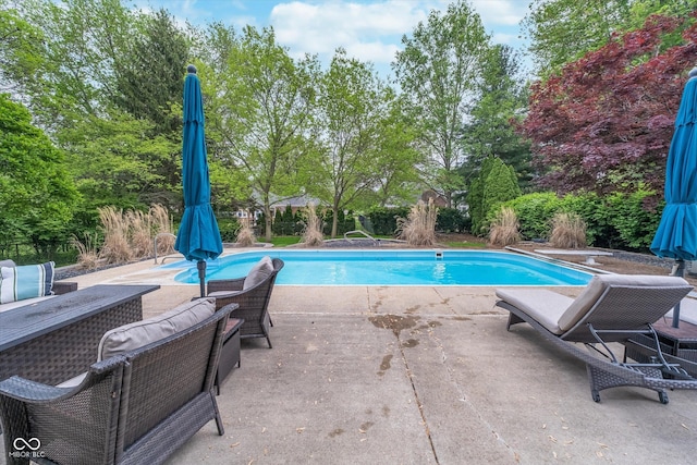 4401 W Hunters Ridge Ln W, Greenwood, IN 46143 - outdoor pool with a patio and a diving board