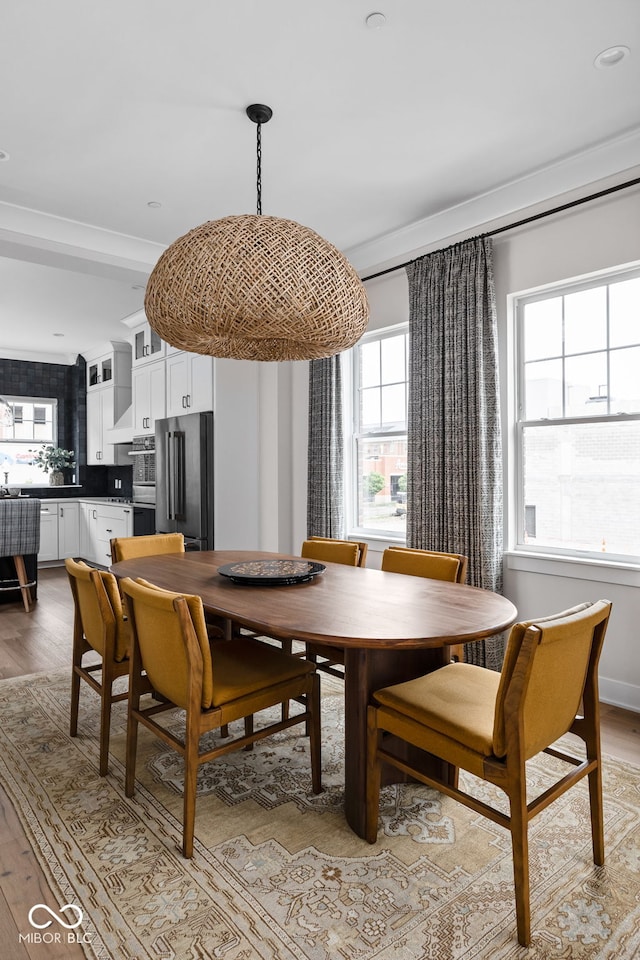 dining space with light wood-style floors