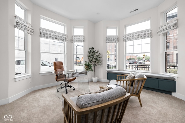 interior space featuring visible vents and a wealth of natural light