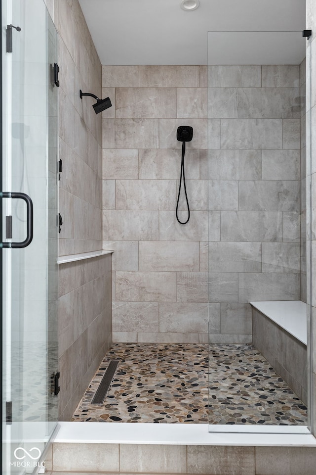 full bathroom with a shower stall
