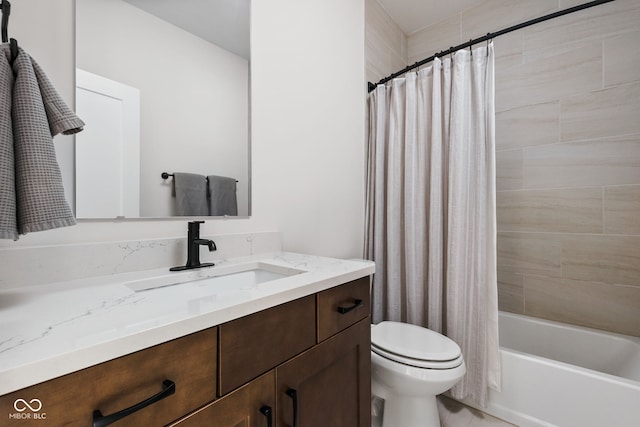 full bath with vanity, shower / tub combo, tile patterned floors, and toilet