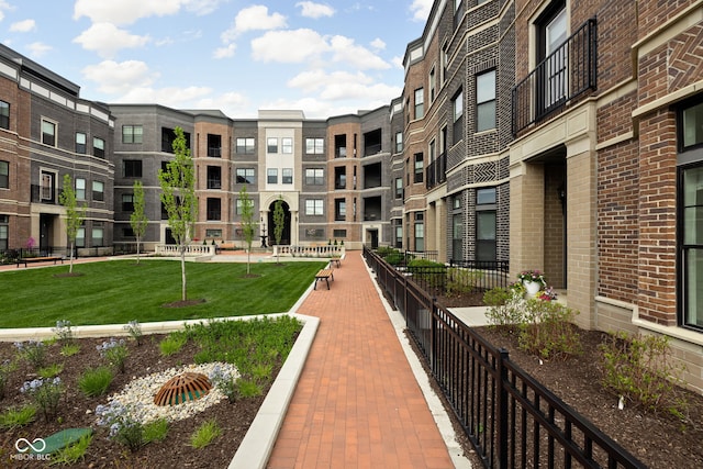 view of property's community with fence
