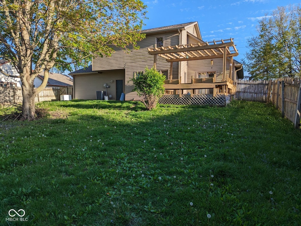rear view of house with a deck, a pergola, and central air condition unit