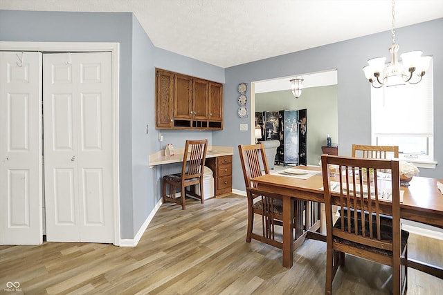 11620 E 75th St, Indianapolis, IN 46236 - dining room featuring a chandelier, light wood-style floors, baseboards, and an office area