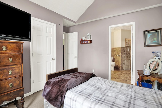 11620 E 75th St, Indianapolis, IN 46236 - bedroom with lofted ceiling, carpet, and connected bathroom