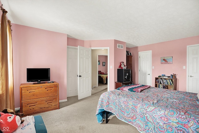 11620 E 75th St, Indianapolis, IN 46236 - bedroom with light colored carpet, a textured ceiling, and baseboards