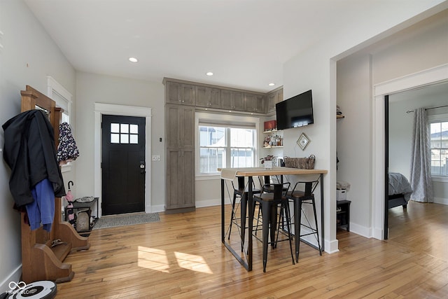 825 Iowa St, Indianapolis, IN 46203 - foyer entrance with light wood finished floors, baseboards, and recessed lighting