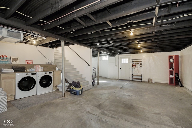 825 Iowa St, Indianapolis, IN 46203 - basement featuring washer and clothes dryer and stairs