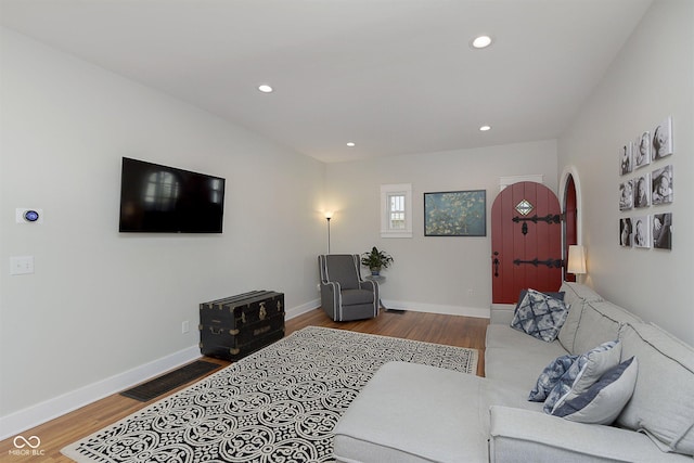 825 Iowa St, Indianapolis, IN 46203 - living area featuring recessed lighting, baseboards, and wood finished floors