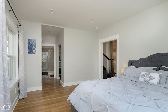 825 Iowa St, Indianapolis, IN 46203 - bedroom featuring wood finished floors, baseboards, and recessed lighting