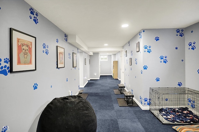 hallway featuring recessed lighting and baseboards