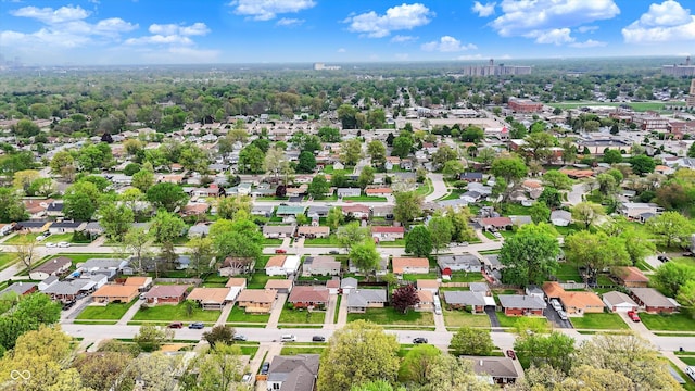 birds eye view of property with a residential view
