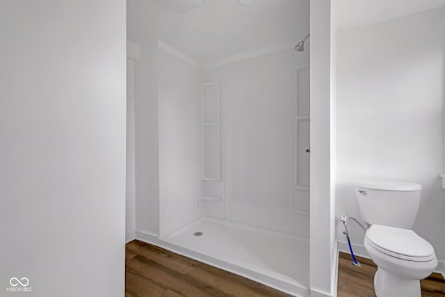 555 S Auburn St, Indianapolis, IN 46241 - full bath featuring a shower, baseboards, wood finished floors, and toilet