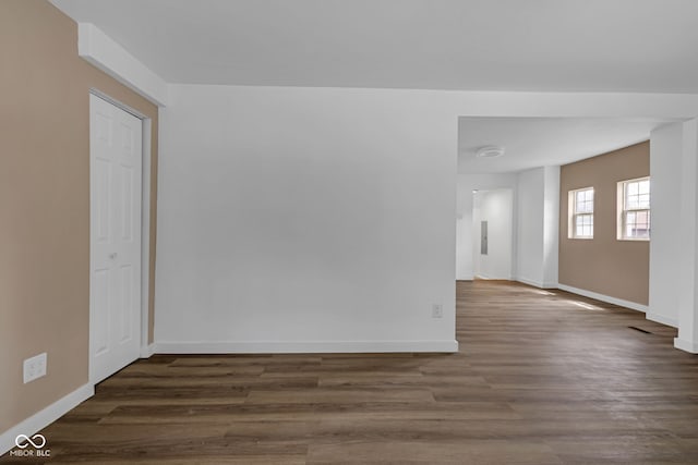 555 S Auburn St, Indianapolis, IN 46241 - empty room with dark wood-type flooring and baseboards