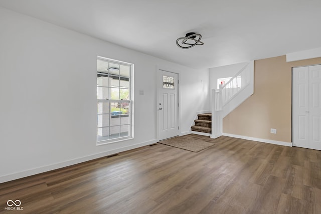 555 S Auburn St, Indianapolis, IN 46241 - foyer with baseboards, visible vents, wood finished floors, and stairway
