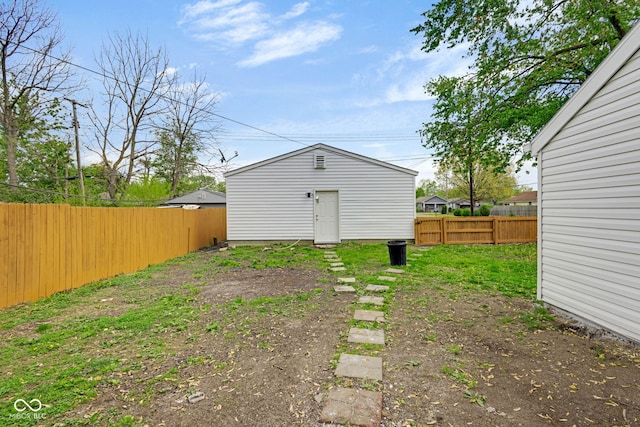 555 S Auburn St, Indianapolis, IN 46241 - back of property featuring an outbuilding and a fenced backyard