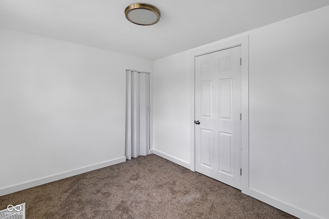 555 S Auburn St, Indianapolis, IN 46241 - unfurnished bedroom featuring carpet flooring and baseboards
