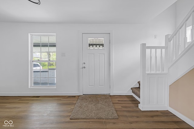 555 S Auburn St, Indianapolis, IN 46241 - foyer entrance with stairway, baseboards, wood finished floors, and visible vents